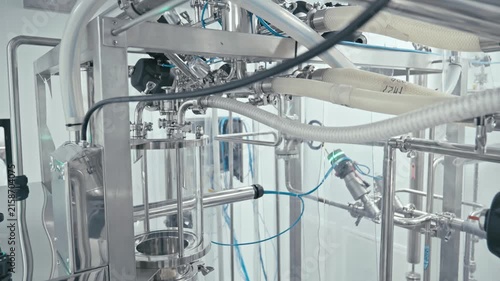 Production equipment at medical industry. Complex machinery showcases intricate designs and precision at facility
