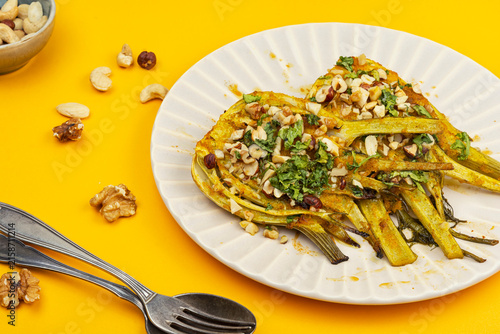 Mediterranean roasted fennel with walnuts, hazelnuts and herbs