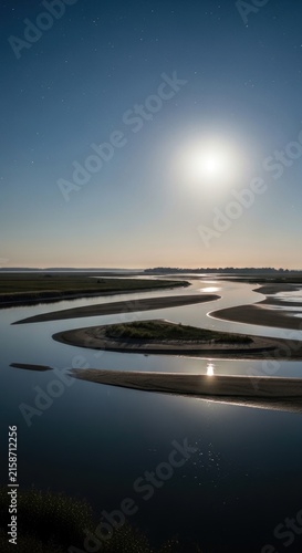 Serene River Landscape Under Bright Sunlight.