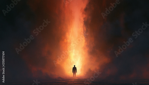 Silhouette of man standing inside pillar of fire. Surreal scene with human figure surrounded by intense flames and thick smoke.