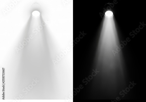 Spotlight beam with lens flare and glowing light rays on black background, isolated stage lighting effect for digital art, graphic design, photo overlays, and cinematic compositing compositions