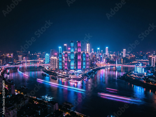 Vivid Neon City Skyline Reflections at Night