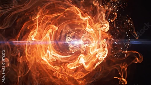 Dynamic swirling fire vortex with glowing embers and a central lens flare on a black background.