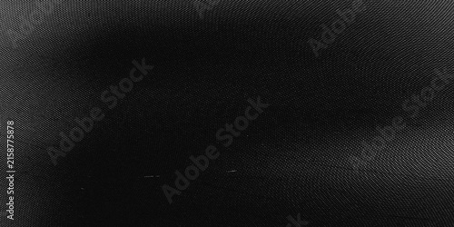 Obraz na plátne Abstract dark fabric texture with subtle circular patterns and minimal light gra