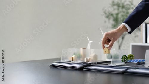 Fund Manager Conducting Responsible Investment Screening and ESG Fund Selection with Renewable Energy Assets