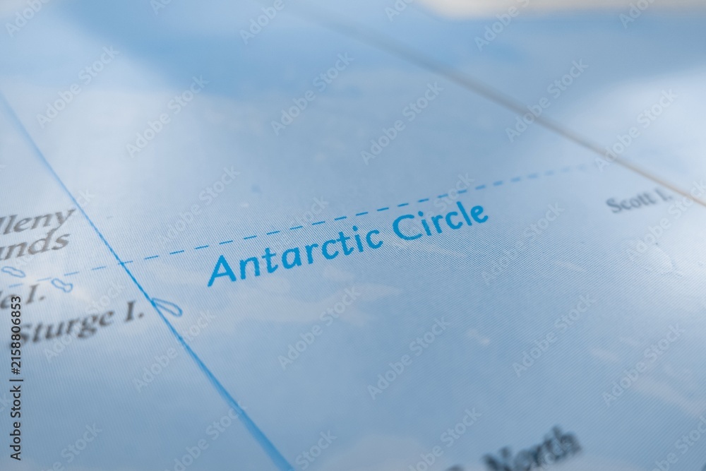 Naklejka premium Map of Antarctic Circle styled in grey color. Selective focus on label, close-up view