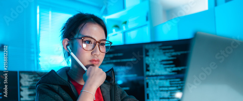 women software developer analyzing source code with a digital pen in a modern office, representing programming, software engineering, code review, debugging, technology, innovation, IT productivity.