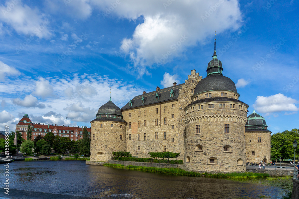 Fototapeta premium Romanesque Örebro Castle in Sweden standing over Svartån river