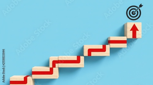 Wooden blocks forming stairs with a red arrow pointing to a target