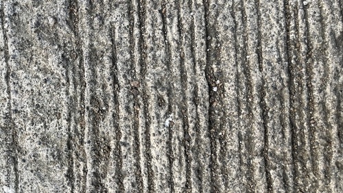 Foto Rough brushed concrete pavement texture background