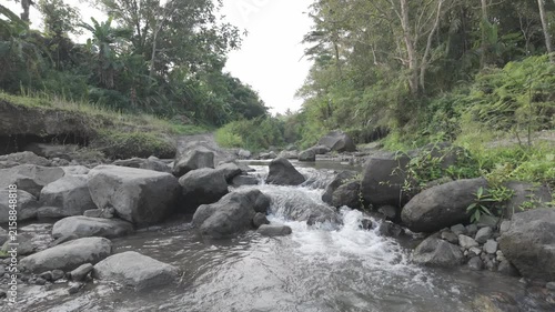 Static View of Rocky Stream and Small Waterfall in Tropical Forest