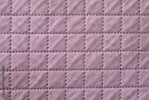 Light quilt bedcover with relief Narrow focus line, shallow depth of field