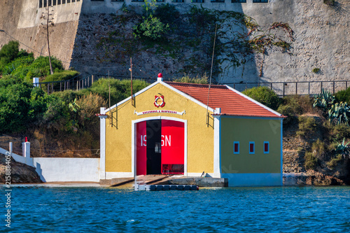 Colorful historic lifesaving station building by the river in Vila Nova de Milfontes