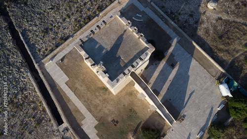 TORRE DI TORRE LAPILLO DALL ALTO, ANTICA FORTEZZA COSTIERA A PORTO CESAREO
