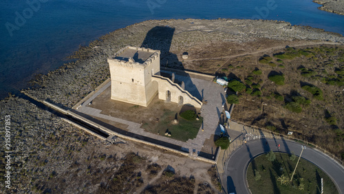 TORRE DI TORRE LAPILLO DALL ALTO, ANTICA FORTEZZA COSTIERA A PORTO CESAREO