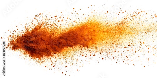 A dynamic explosion of warm brown and orange spice powder disperses against a clean white background.