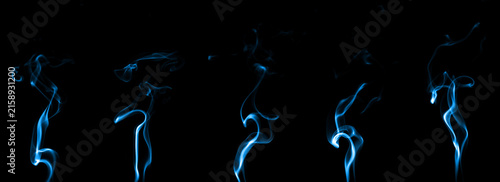 Fotografía Abstract blue smoke wisps flowing on a black background, creating elegant luminous curves and soft motion