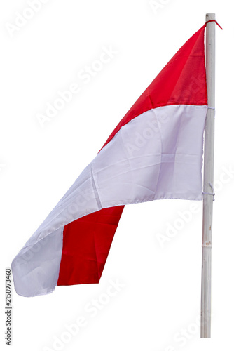 The Indonesian Red and White flag on a bamboo pole, Indonesian national flag waving against a white background.