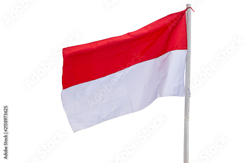 The Indonesian Red and White flag on a bamboo pole, Indonesian national flag waving against a white background.