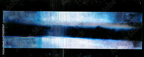 Grungy abstract blue and black panoramic texture with light leak