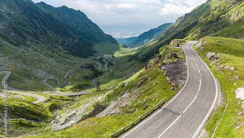 Winding Asphalt Road through Green Carpathian Valley