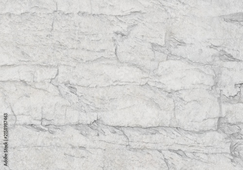 Natural white slate rock wall texture background, light grey stone surface for backdrop design.