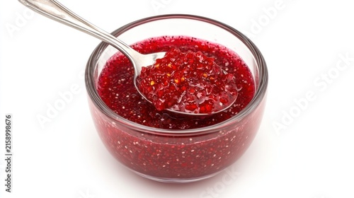Close up of a bowl with jam and spoon