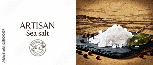 Pile of coarse sea salt crystals with peppercorns on a slate board. Vintage style graphic background showing traditional salt harvesting pans. Gourmet seasoning concept for food packaging design.