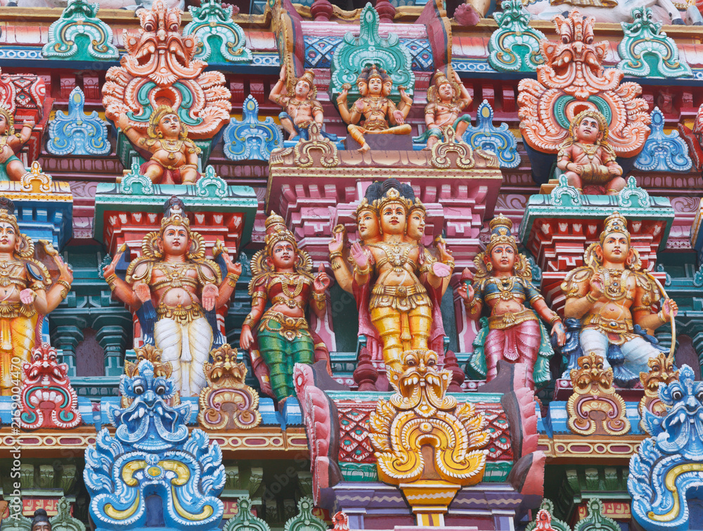 Fototapeta premium A sculptures on Hindu temple gopura (tower). Menakshi Temple, Madurai, Tamil Nadu, India
