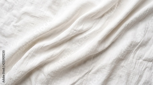 Soft crumpled white fabric texture with natural folds and subtle woven pattern, a versatile textile background