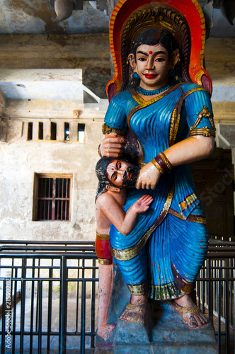 Canvastavla Spiritual stone statue of hindu god in ancient temple, India.