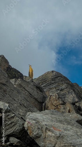Golden Statue of Our Lady of the Snows Standing on Rocky Ridge at Monte Moro Pass, Macugnaga