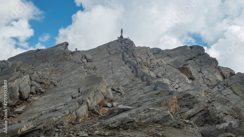 Golden Statue of Our Lady of the Snows Standing on Rocky Ridge at Monte Moro Pass, Macugnaga
