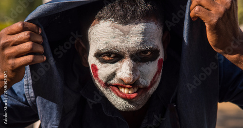 Bild auf Leinwand Close-up portrait of a horrible scary zombie man