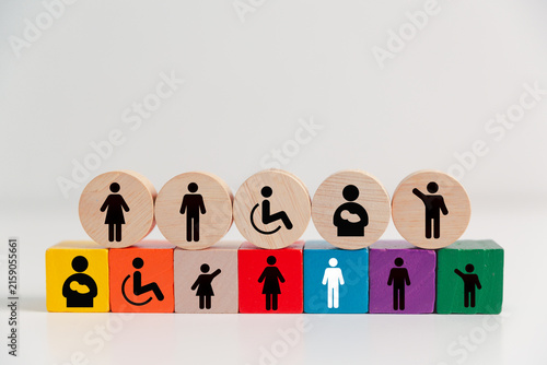 Bild auf Leinwand Diversity and inclusion concept featuring diverse people and accessibility symbols on colorful wooden blocks, representing equality, accessibility, representation, belonging and social inclusion