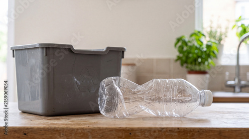 Used empty plastic bottle prepared for household recycling