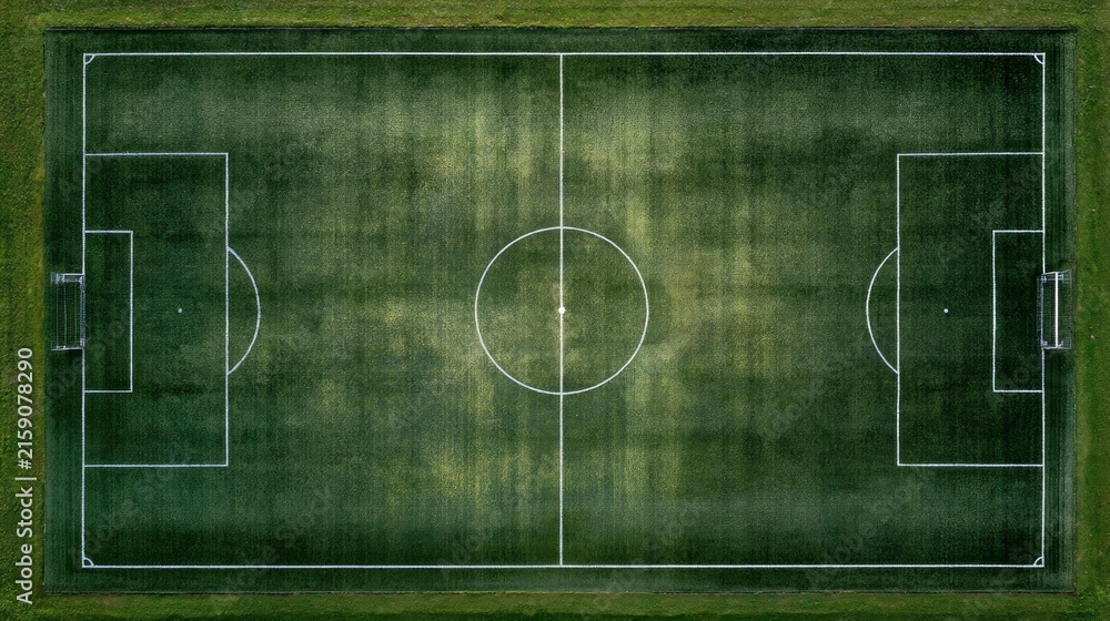 Obraz premium Aerial View of Soccer Field with Green Grass and White Markings