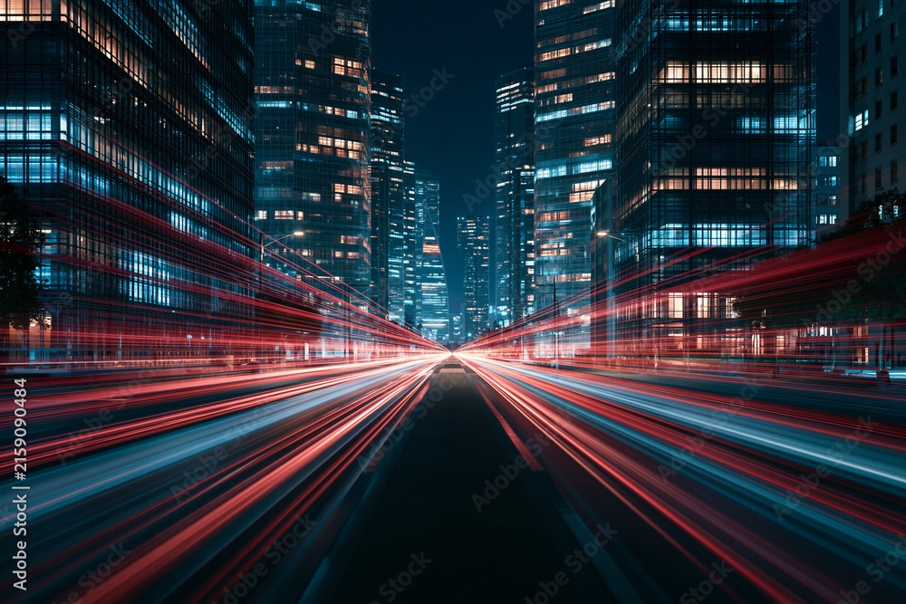 Naklejka premium Dynamic City Night with Streaking Light Trails