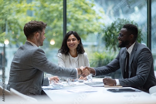Business Team Shaking Hands Celebrating a Successful Partnership Deal