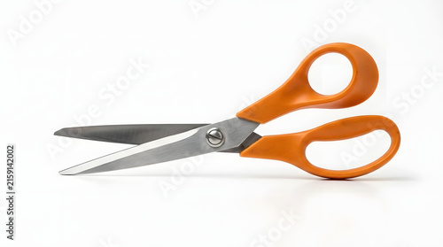 Orange handled scissors on white background