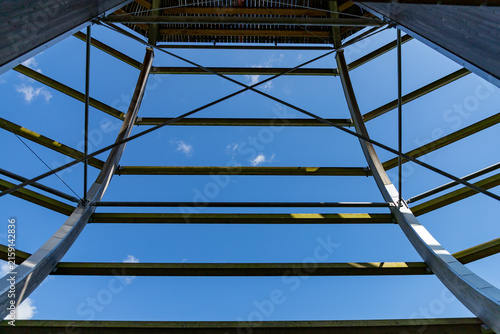 Binz, Ruegen, Mecklenburg-Western Pomerania, Germany-July 23, 2026: Symmetrical view beneath the treetop observation tower.