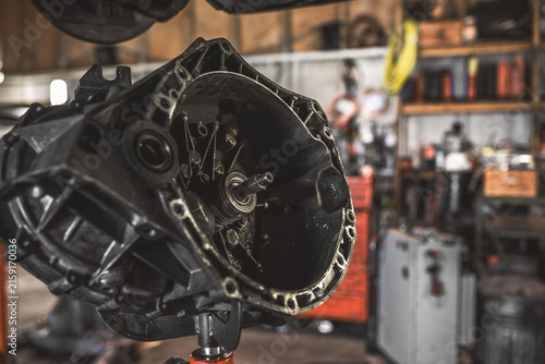 Bild auf Leinwand Automotive transmission housing undergoing repair in a workshop setting
