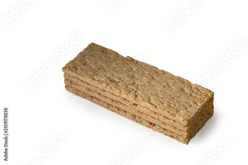 Foto Stack of crispbread slices isolated on white background