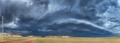 Storm cell formation in Tornado Alley over vast prairie