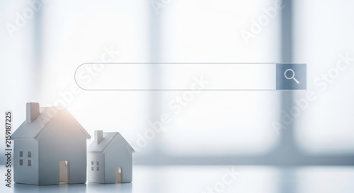 House Search with Toy Houses and Search Bar Depicting Online Real Estate Exploration for Dream Home with Modern and Minimalist Aesthetic