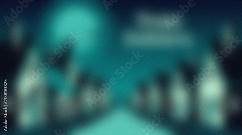 фотографія Blurred bokeh background of Halloween village at night with glowing windows, spo
