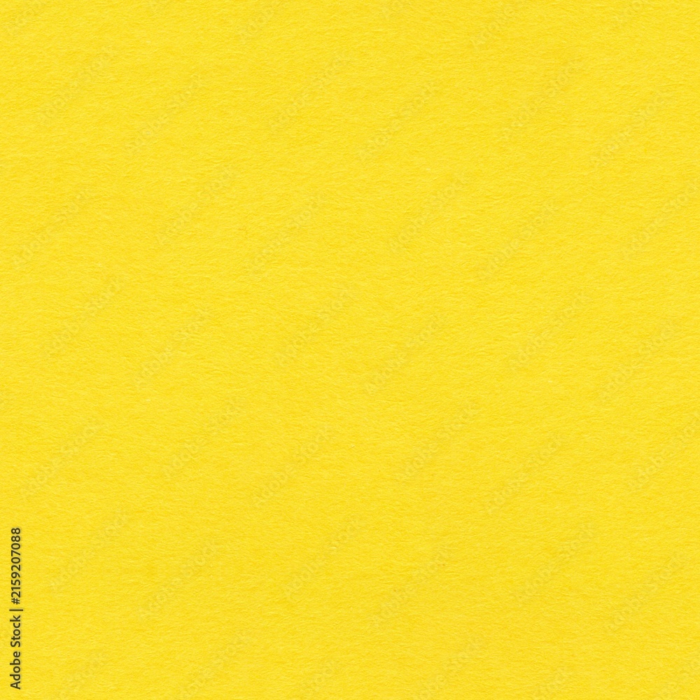 Fototapeta premium Bright yellow paper texture as a seamless square background