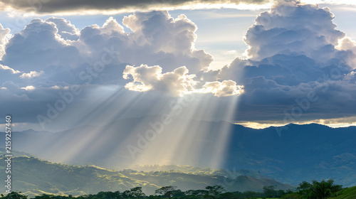 Mountain landscape in sunlight with clouds
