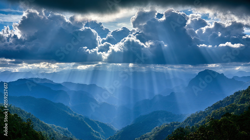 Mountain landscape in sunlight with clouds