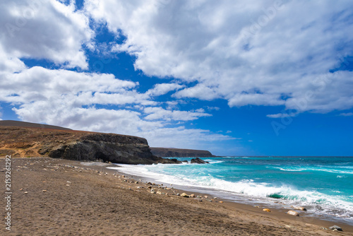 Rock formations and caves on the Atlantic Ocean coast in Ajuy, Fuerteventura, wallpaper or background for your project